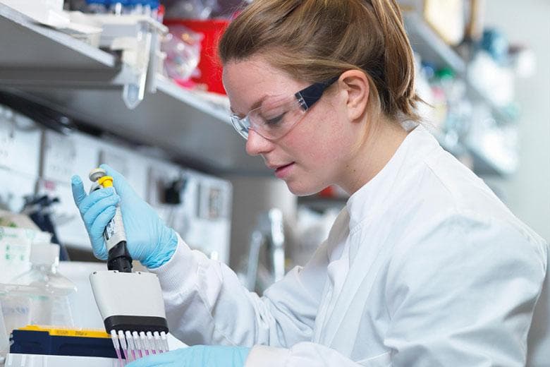 Young scientist at work in laboratory